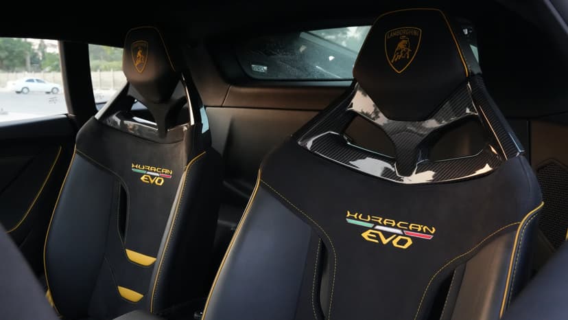 Rent Blue + Yellow Lamborghini Huracan Evo GT Celebration No. 11 Edition 2020 in Dubai - Interior 2
